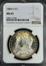 Load image into Gallery viewer, 1884-O $1 Morgan NGC MS65 -- Lustrous Gem w/ Gold & Sea Green Peripheral Toning