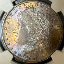 Load image into Gallery viewer, 1885-O $1 Morgan Dollar NGC MS65 -- Incredible Bright Orange & Purple Toned Gem