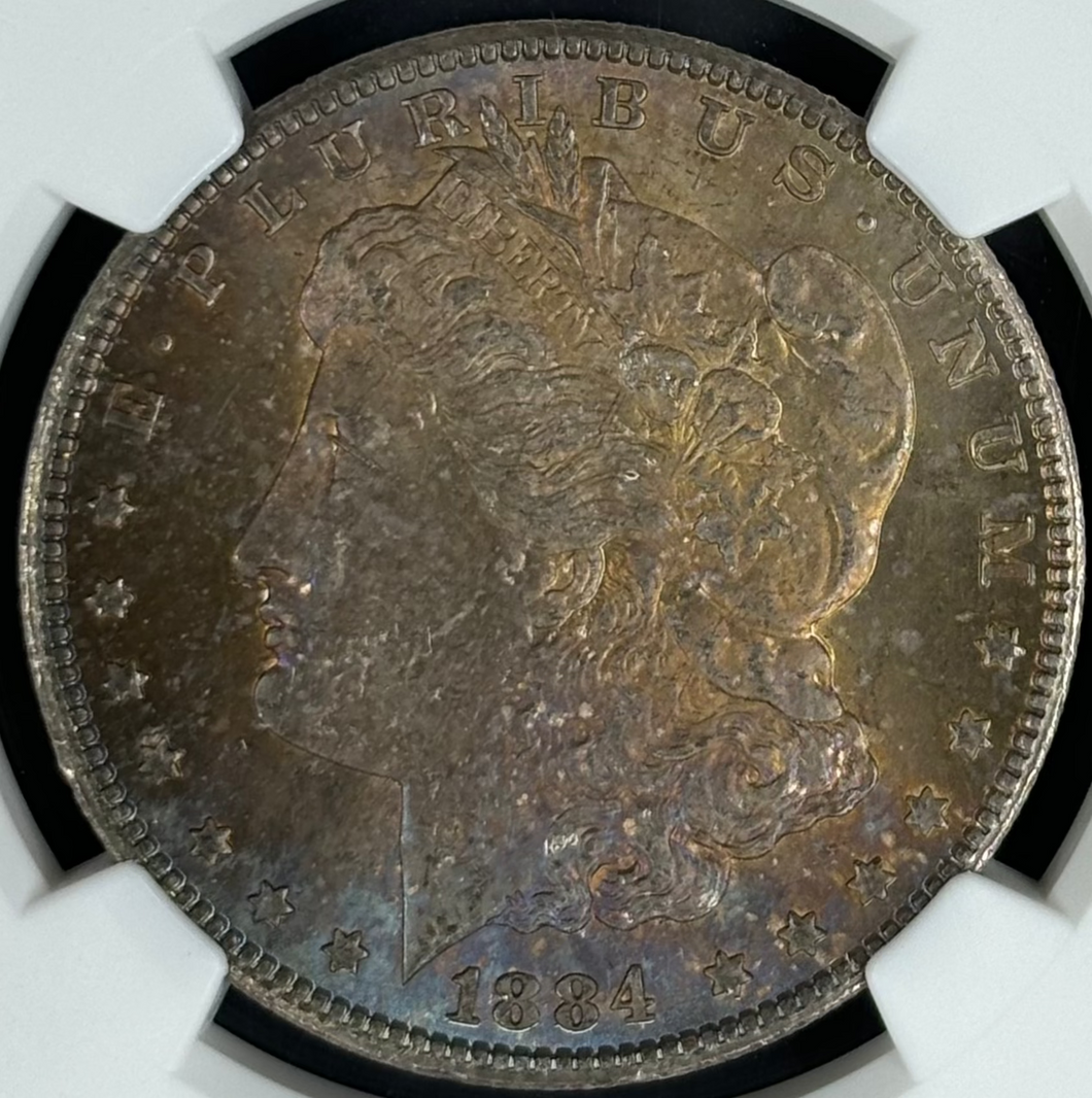 1884-CC $1 Morgan Dollar NGC MS66 -- Beautiful Gold, Blue & Russet Toning