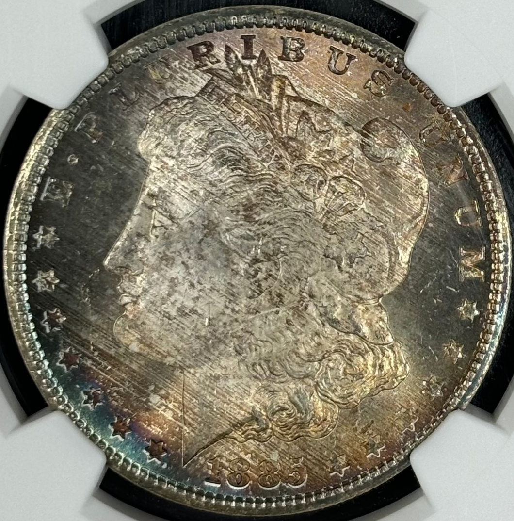 1885-CC $1 Morgan Dollar NGC MS66 -- Wonderful Orange, Blue & Russet Toned Gem