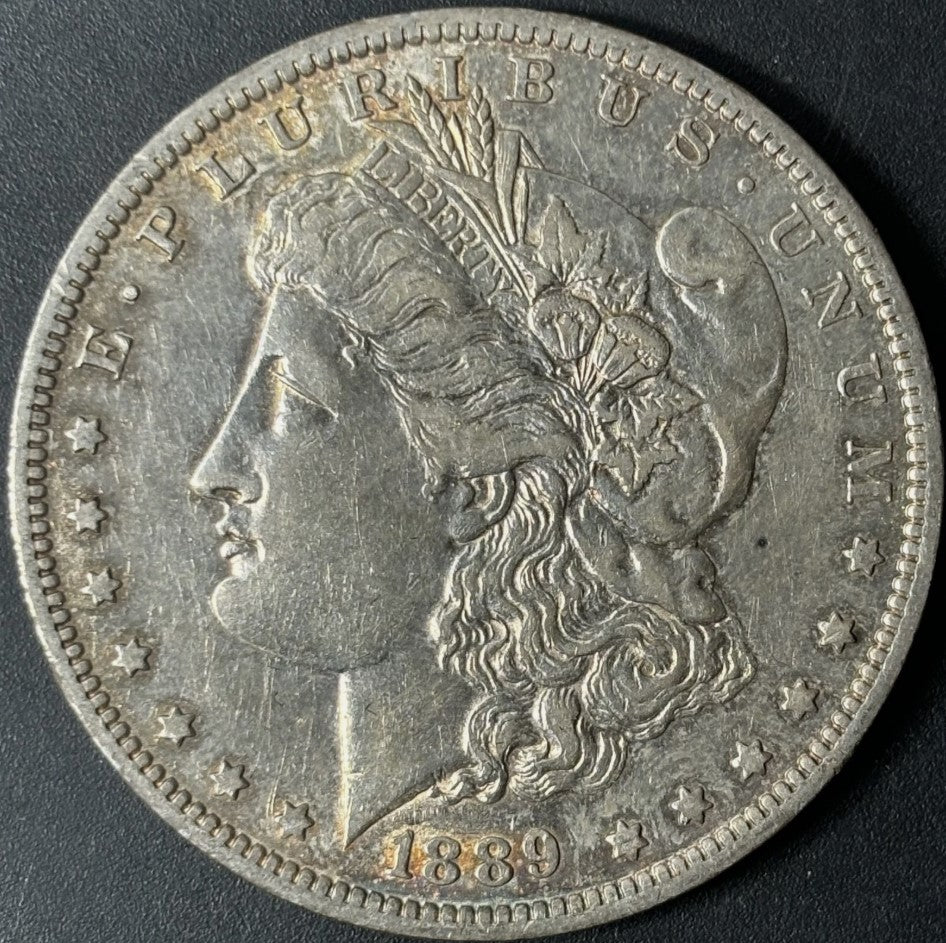 1889-O $1 Morgan Dollar Raw - AU - See Pictures