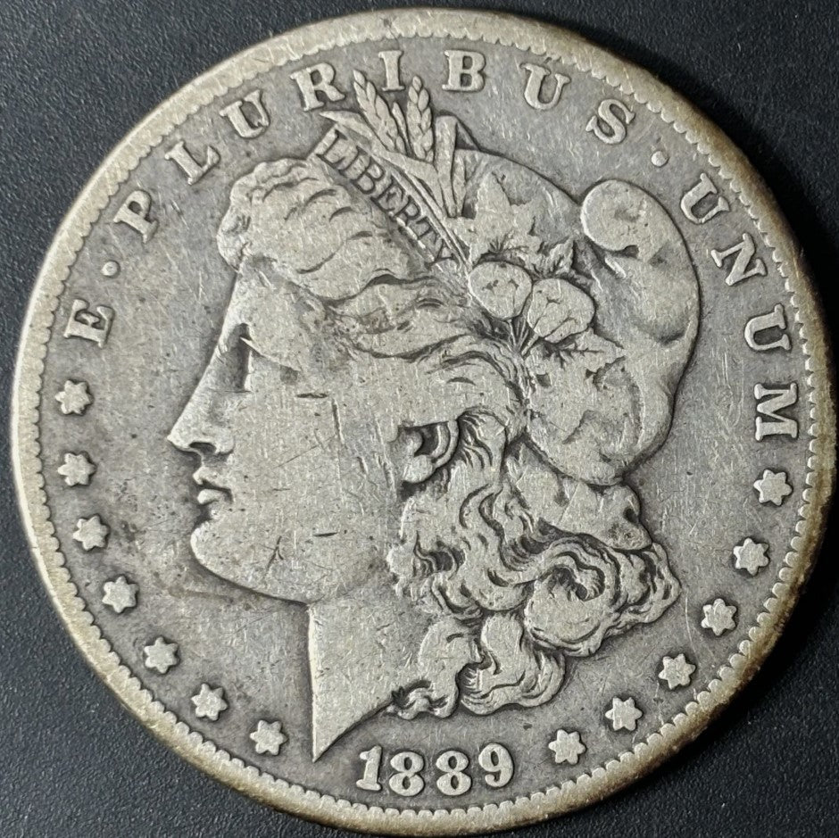 1889-CC $1 Morgan Dollar Raw - F/VF - See Pictures