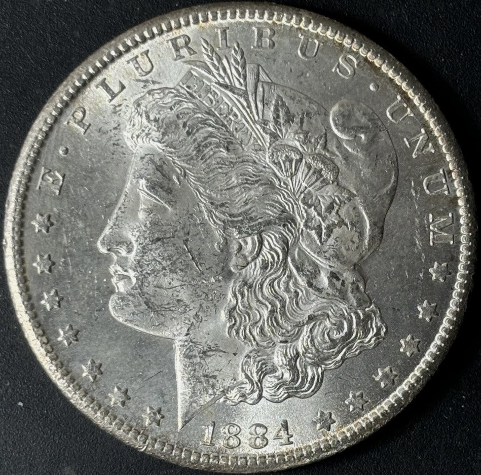 1884-CC $1 Morgan Dollar Raw - Uncirculated - See Pictures