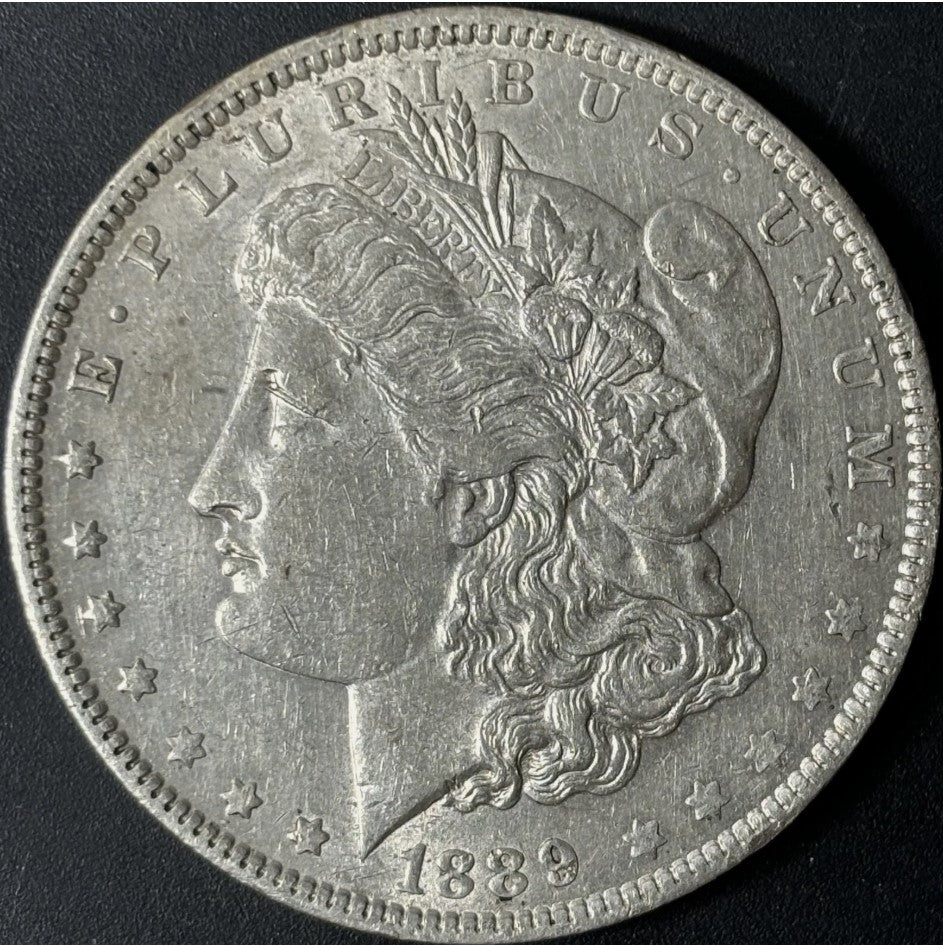 1889-O $1 Morgan Dollar Raw - AU - See Pictures