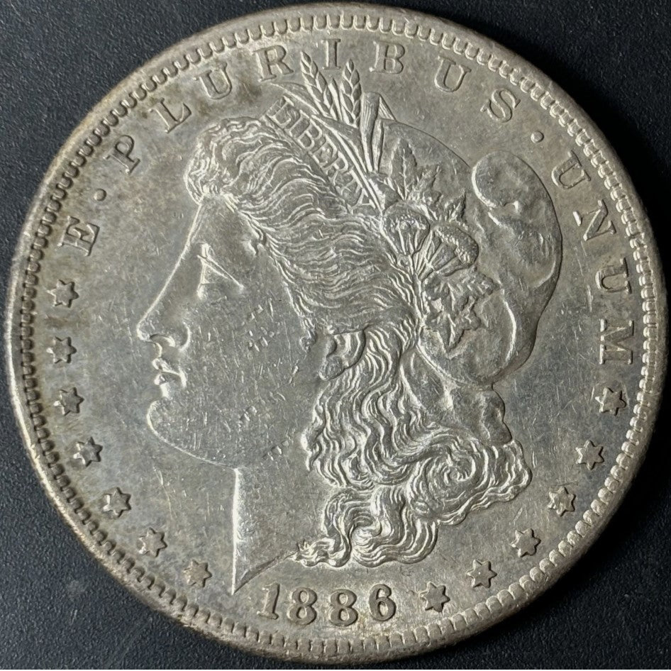 1886-S $1 Morgan Dollar Raw - AU - See Pictures