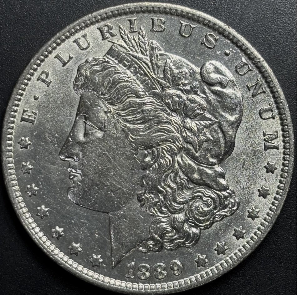 1889-O $1 Morgan Dollar - Raw AU - See Pictures