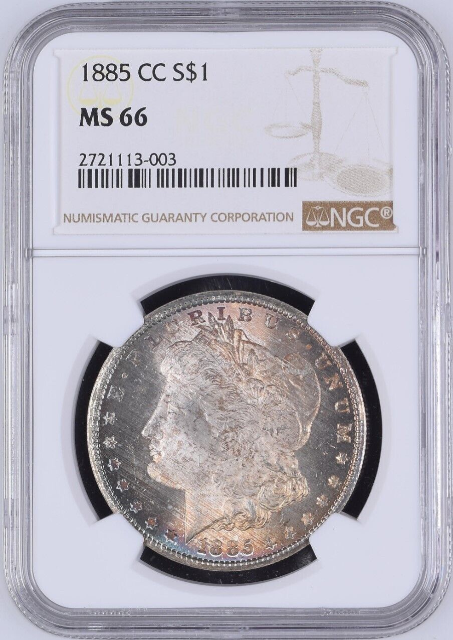 1885-CC Morgan Silver Dollar NGC MS66 - - Pretty Golden and Blue Toning