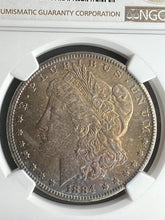 Load image into Gallery viewer, 1884-CC Morgan Silver Dollar NGC MS66 - - Beautiful Golden, Blue. Burgundy Toned
